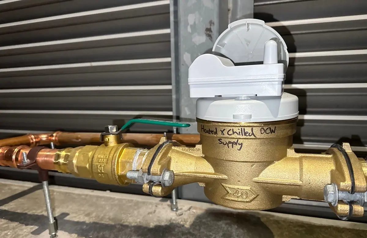 40mm water meter with IoT data logger installed on a labelled supply line